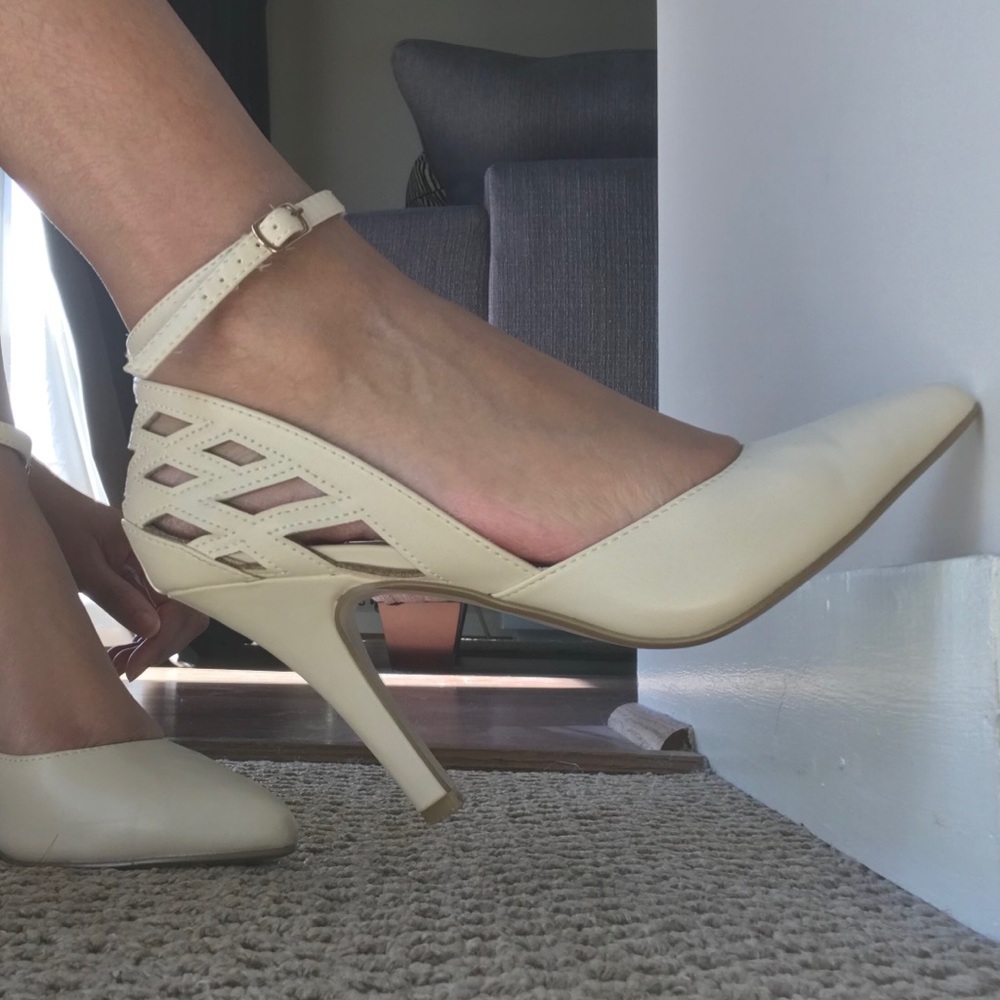 Restricted ankle strap heels